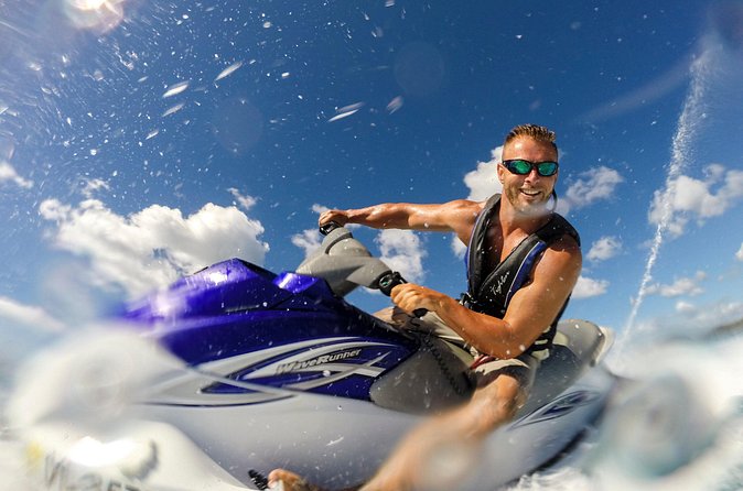 1-Hour Guided Jet Ski Tour in St. Thomas from Frenchman's Reef - Riding through St. Thomas Harbor