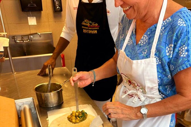 Naturally Tasty by RotiMan Taste/Learn Experience in Tortola, BVI - Rolling and shaping the roti